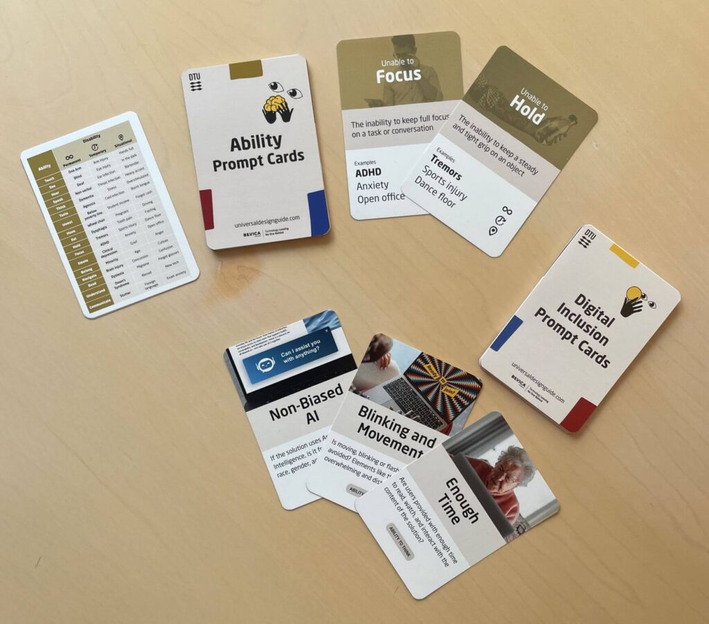 A set of cards from DTU Skylab called “Ability Prompt Cards” and “Digital Inclusion Prompt Cards.” The cards display examples such as “Unable to Focus” with ADHD and anxiety, “Unable to Hold” with tremors and physical challenges, and topics like “Non-Biased AI” and “Enough Time”. They are used to promote inclusive design and understanding of different user needs.